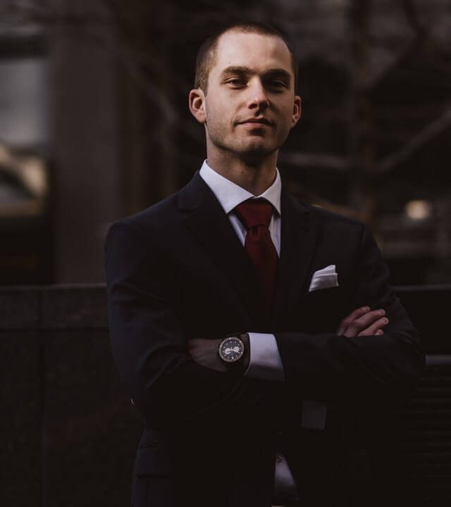 man-wearing-black-notched-lapel-suit-jacket-in-focus man-wearing-black-notched-lapel-suit-jacket-in-focus