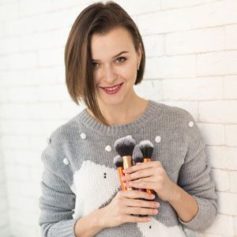 Girl with makeup brush kit